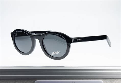 how-to-spot-fake-prada-sunglasses ebay|knock off black prada sunglasses.